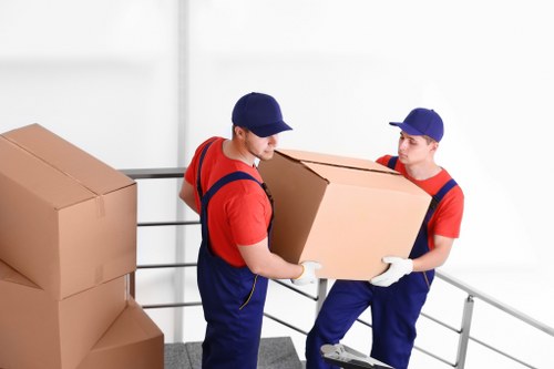 Removals Ireland crew loading reusable furniture and sorted recyclable materials during a sustainable move