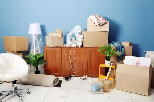 Professional movers handling household furniture in an Irish home