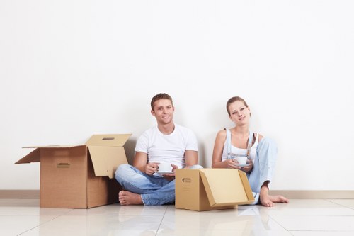 Local moving team handling boxes and household items