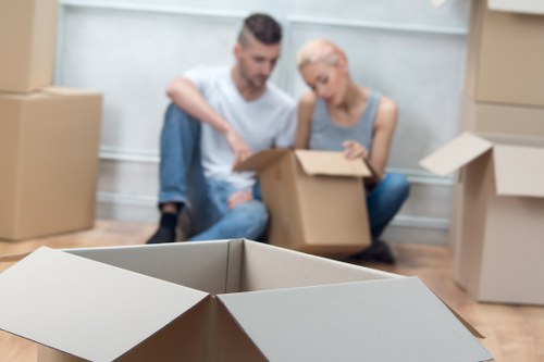 Packed moving boxes and fragile items organized for relocation