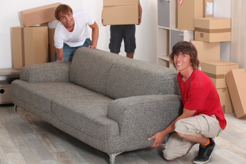Removal van and movers preparing for a residential relocation