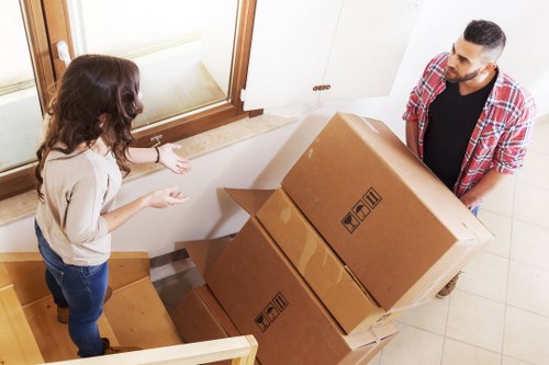 Loading furniture and boxes into a van for a house move in Ireland