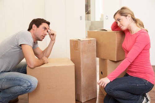 Commercial moving crew loading office equipment for a business relocation