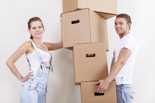 Packed moving boxes and furniture for a local removals service