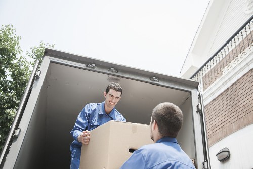 Local movers preparing for a move with boxes and furniture