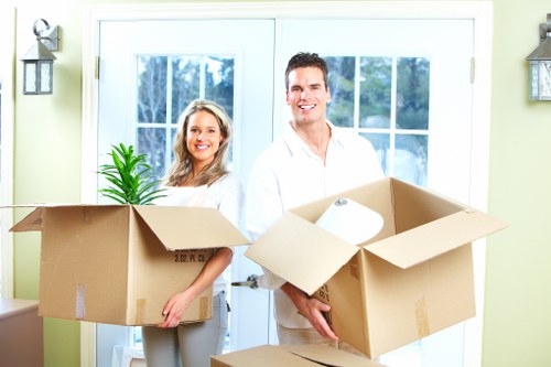 Loading furniture and boxes into a removal truck for transport